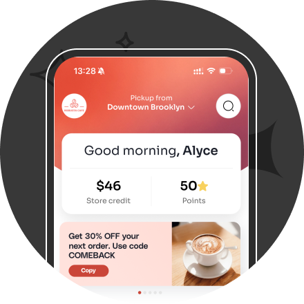 Mobile app screen showing Grounds avenue location with store credit $126, star balance 42, WiFi and bathroom access options, and a birthday greeting with a discount code.